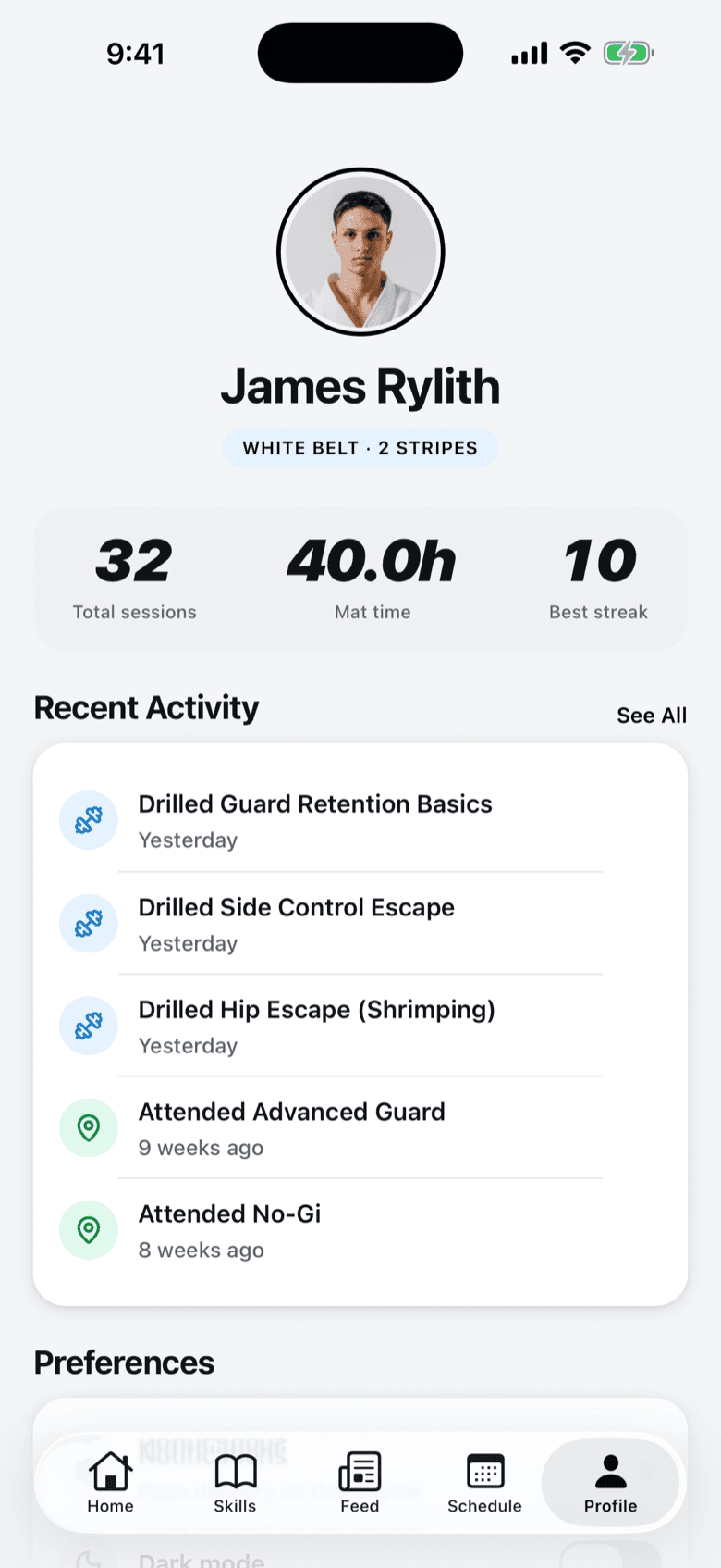 A member profile in the Forma app: white belt with two stripes, 32 total sessions, 40 hours of mat time, and a best streak of 10 weeks.